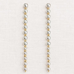 ELLEMADERA GEOMETRIC BOW FAUX PEARL TASSEL EARRING