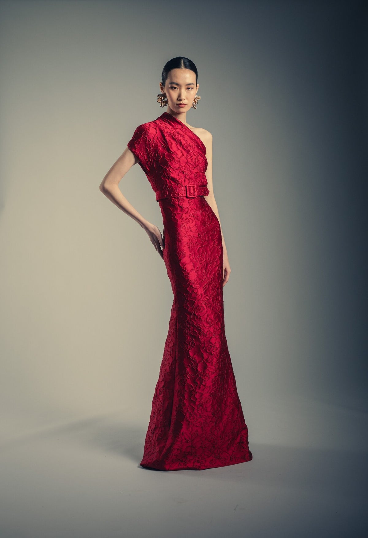BADGLEY MISCHKA ONE SHOULDER BELTED GOWN